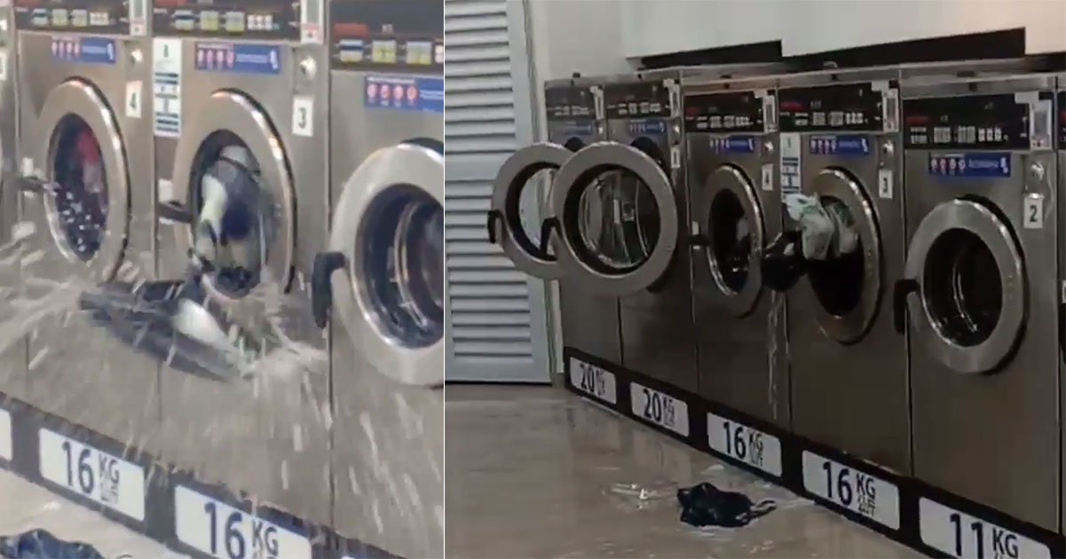 Pasangan basuh ‘playpen’ dalam mesin dobi, kaca bertaburan di seluruh kedai
